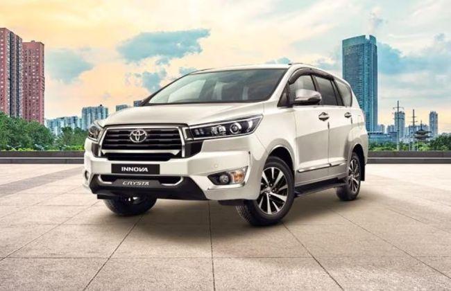 White Toyota Innova Crysta